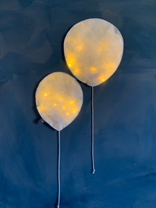 Duet of White Lighting Balloons