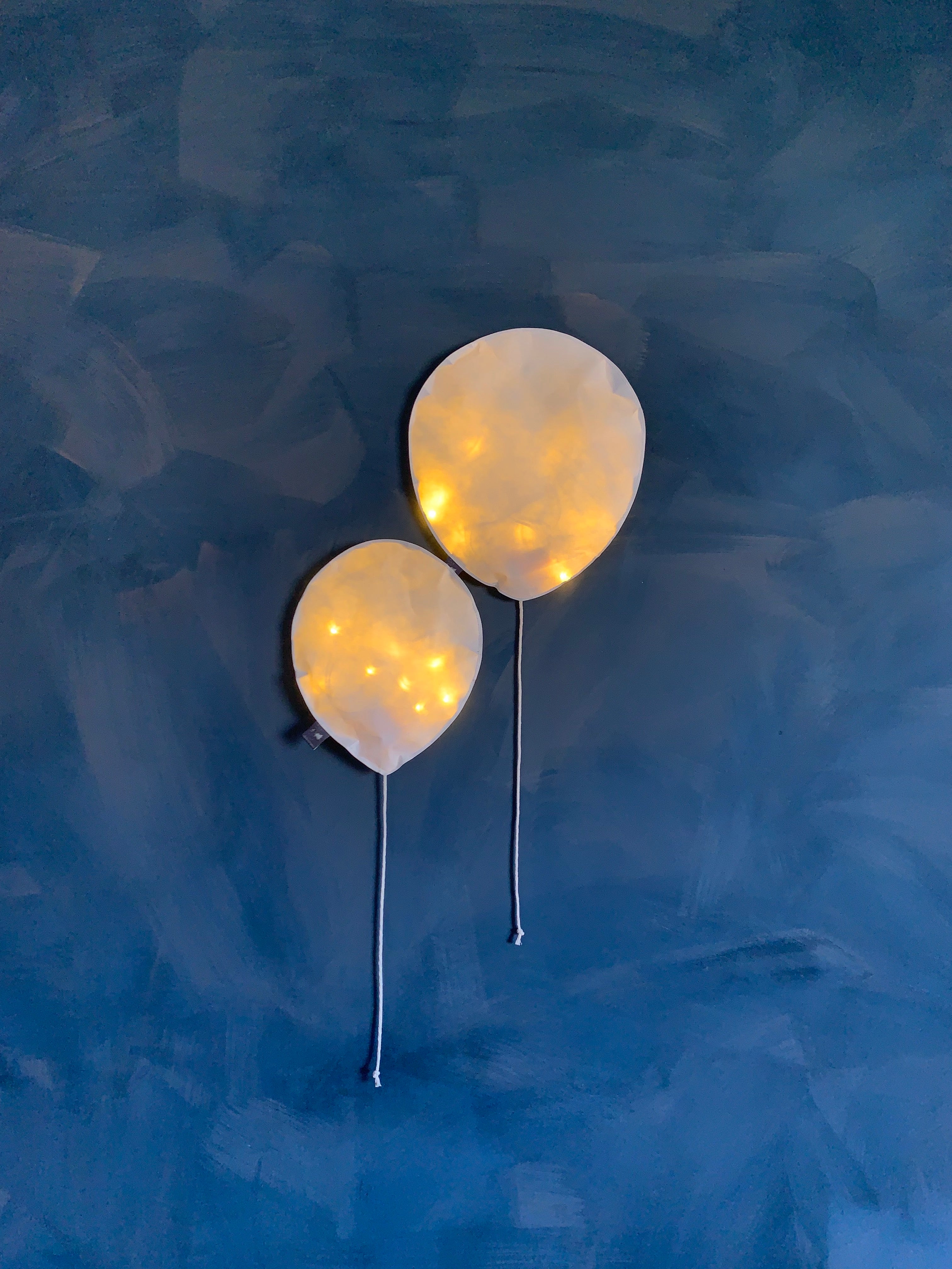 Duet of White Lighting Balloons